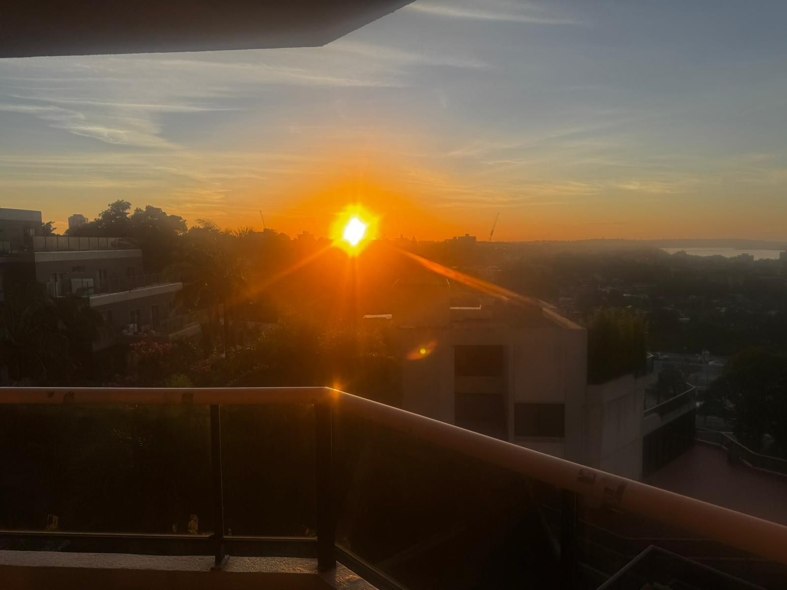 Sydney sunrise from Tim's balcony — the trading system watches markets 24/7